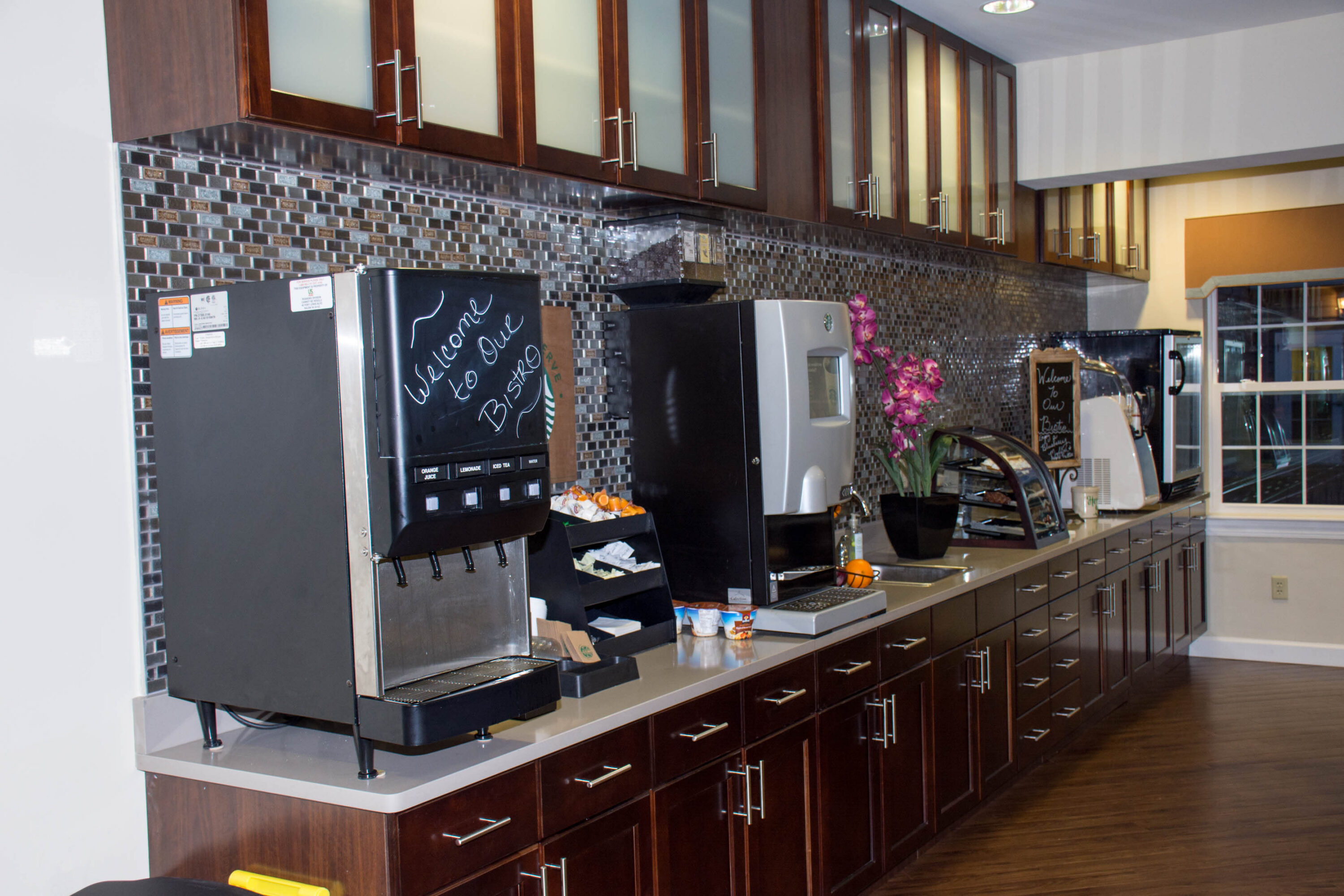 Modern office break room with beverage station